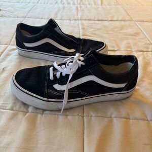 Black and white Vans Old Skool low top shoes
